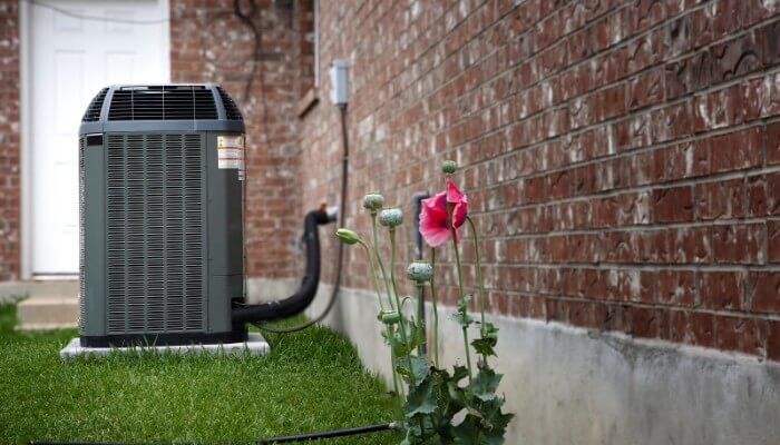 Air Conditioner In Backyard In Spring